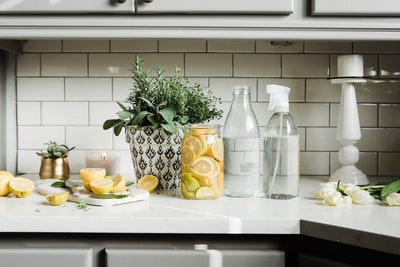 White transparent glass bottles on the table
